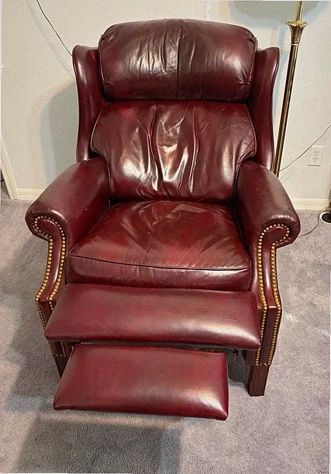 Hancock & Moore Cranberry Colored leather Recliner w/nail head trim. Made In Usa